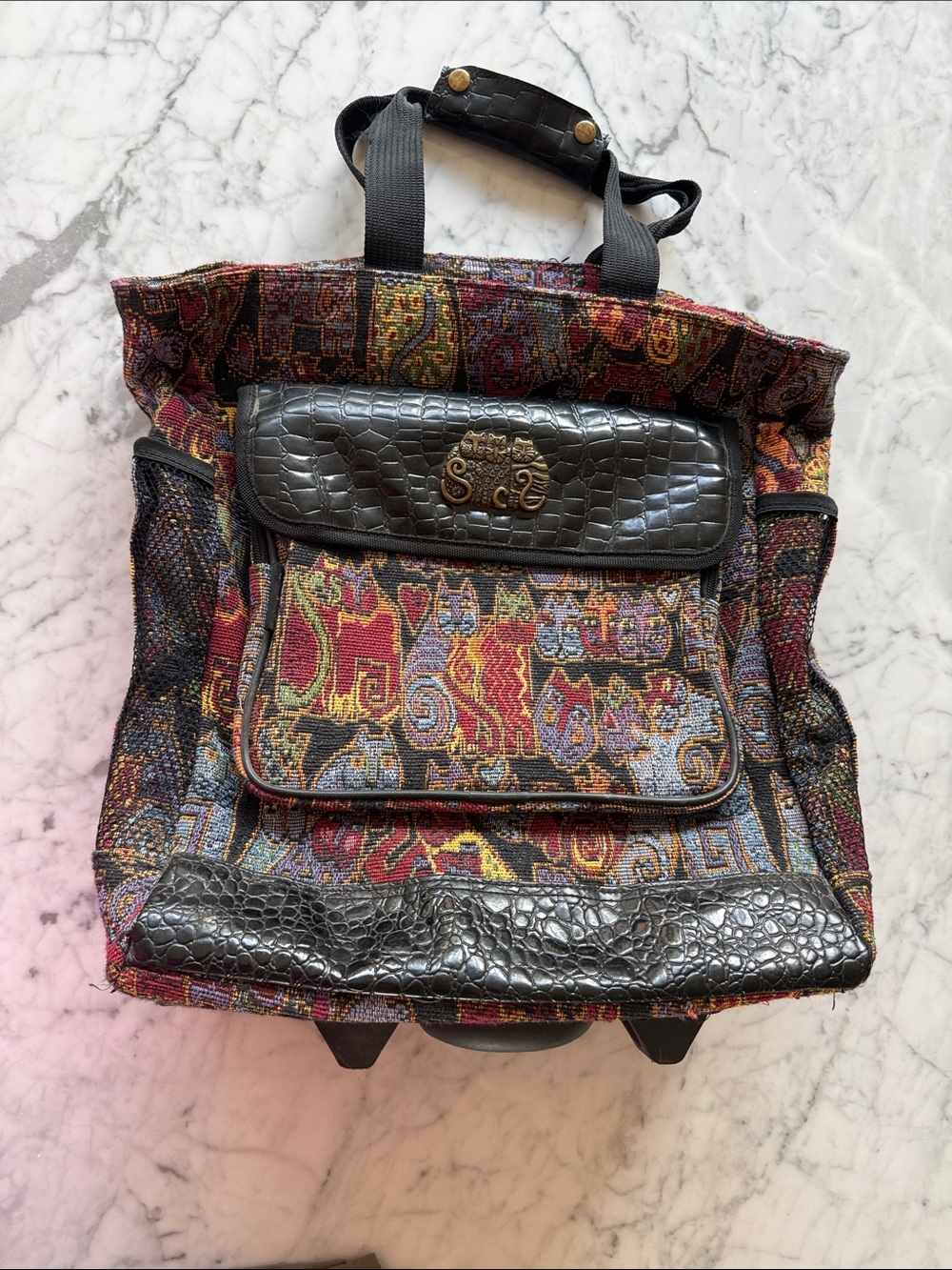 Laurel Burch tapestry 2 wheel carry on with hidden telescoping handle.